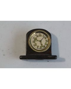 Ancien Taille crayon Horloge bakélite ?
