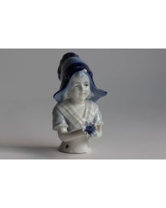 Demi figurine porcelaine Hollandaise tenant une fleur