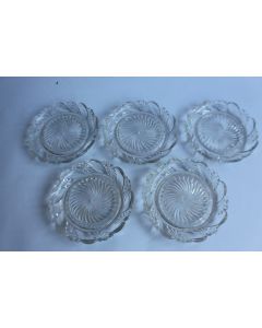 Cinq dessous de bouteille verre moulé d'époque 1900